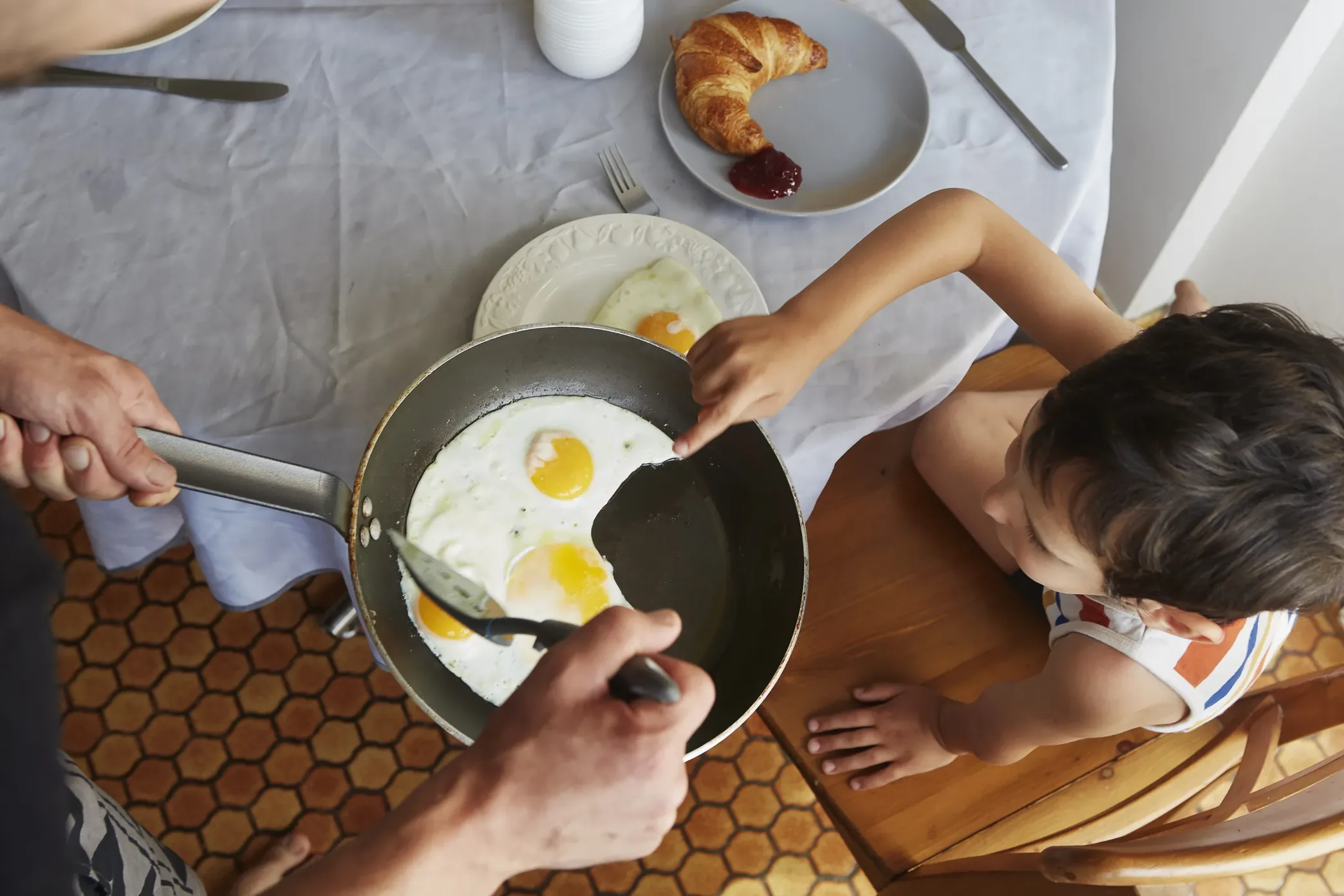 Eggs being cooked in a skillet